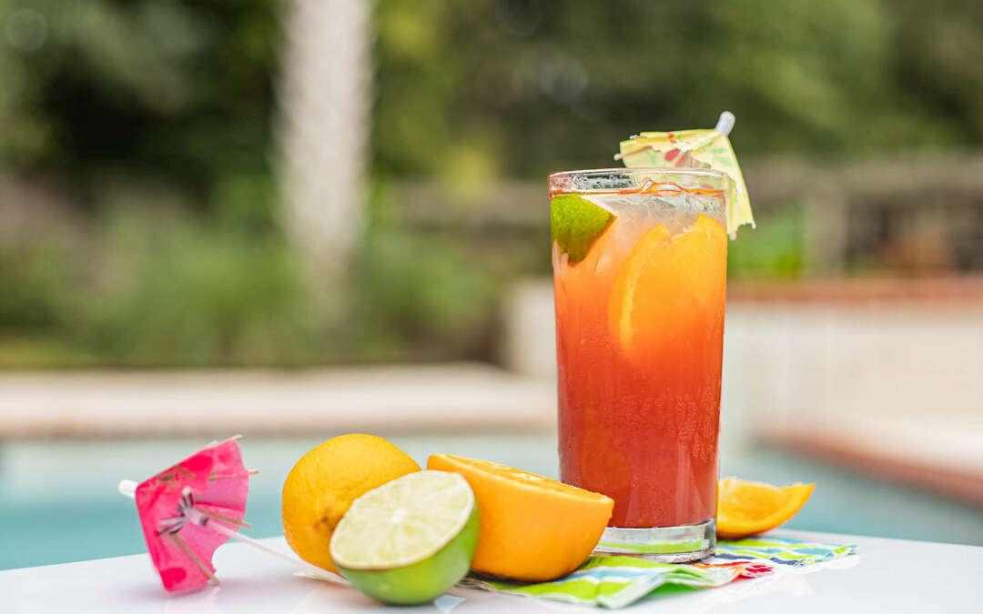 A glass of &quot;Bangin&#039; Sweet Tea Punch&quot; by the pool