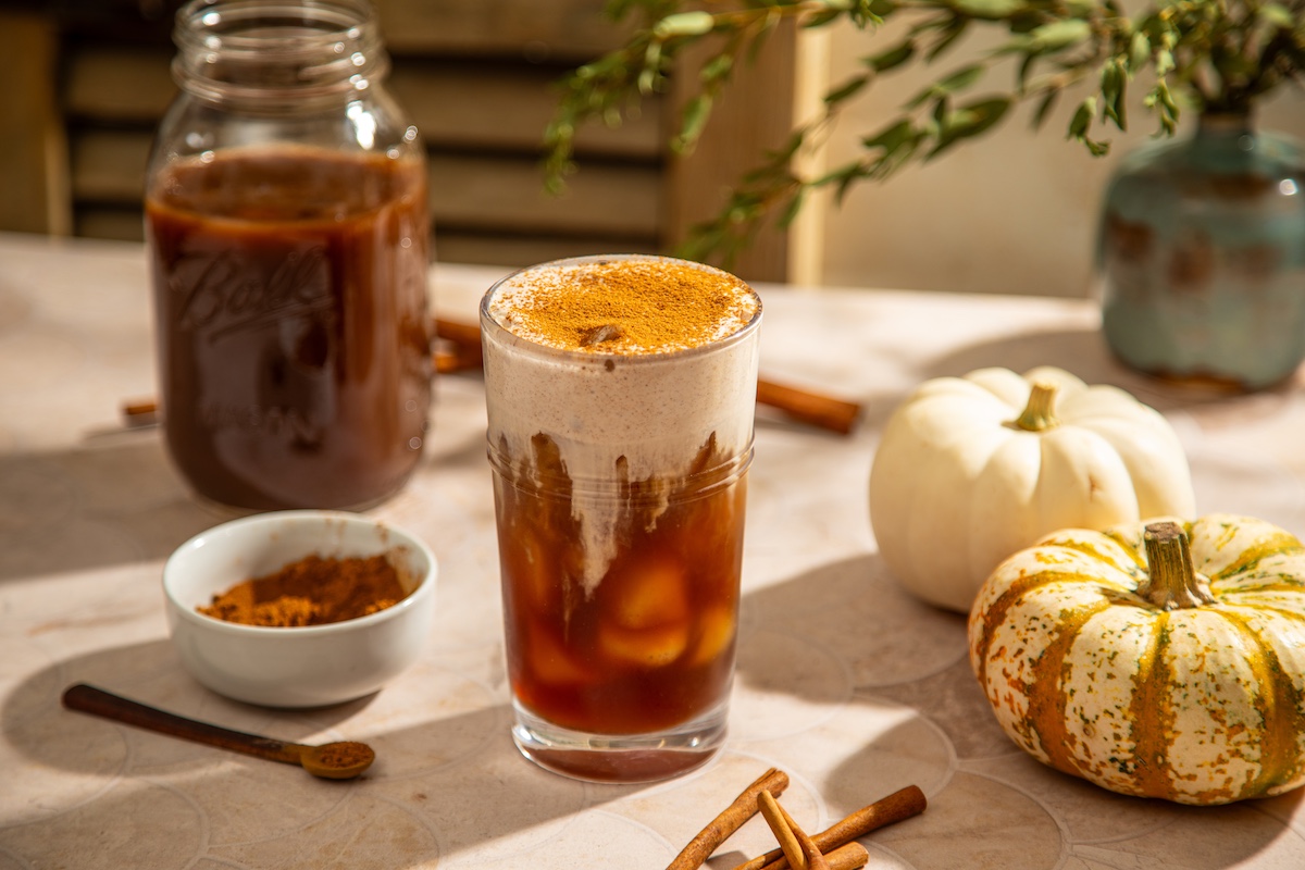 iced chai latte with pumpkin spice cold foam